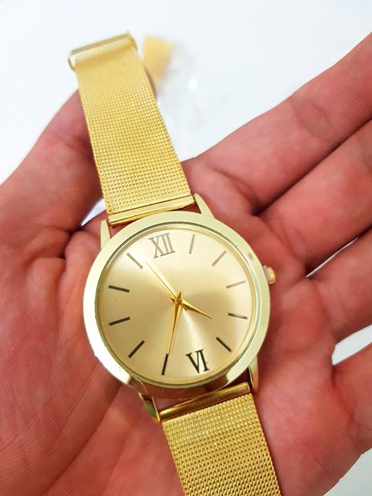 Relógio unissex dourado de aço