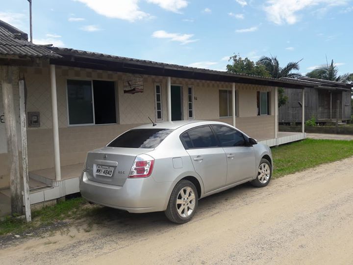 Vendo uma casa com bar cancha de bocha casa bem grande loca ilhas Araranguá mais informações ligar p