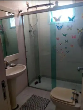 Apartamento Loft impecável há duas quadras da Praia das Pitangueiras no Guarujá