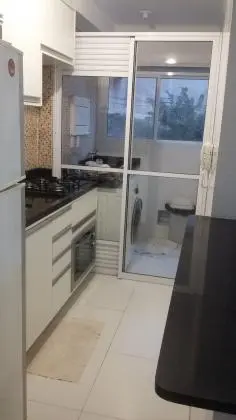 vende-se apartamento com 2 quartos e vaga na garagem