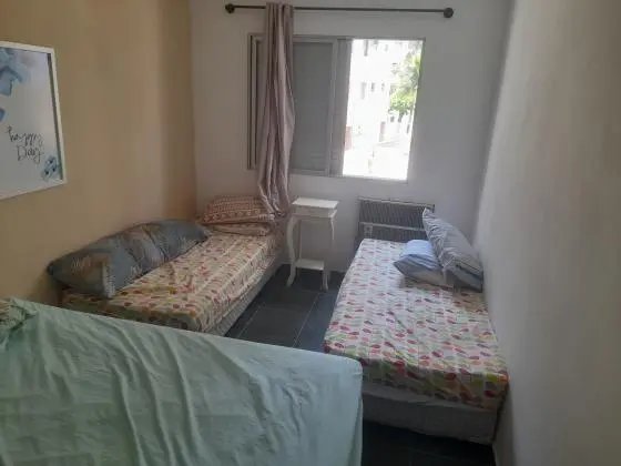 Apartamento na praia da enseada zap 13 988360808