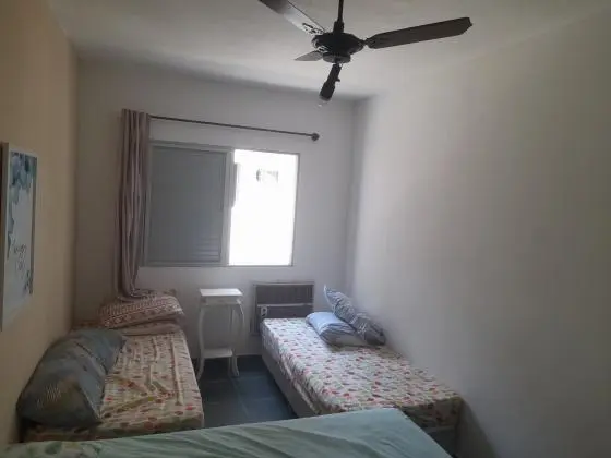 Apartamento na praia da enseada zap 13 988360808
