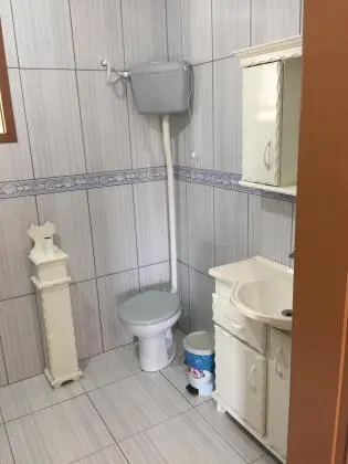 CASA NO CENTRO DA CIDADE DE ARARICÁ - RS