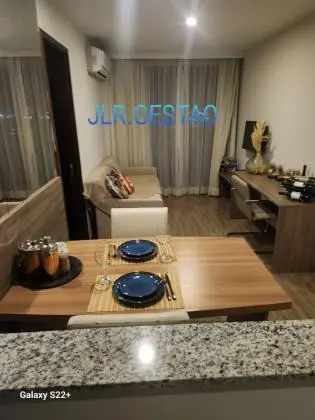 Apartamento com cozinha americana 50m2  varanda com wi-fi tv acabo enxoval