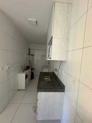 vendo apto em ponta verde quarto e sala semi-mobiliado