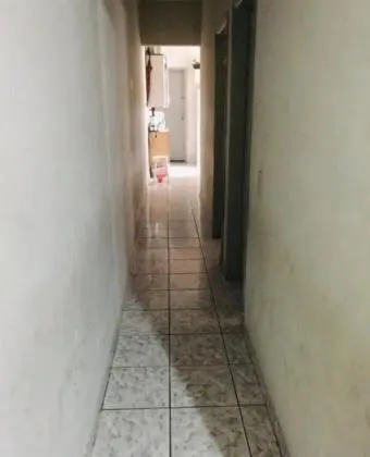 Vendo casa com suite garagem e quintal na praia grande