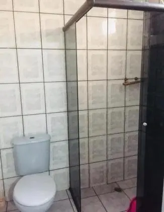 Vendo casa com suite garagem e quintal na praia grande