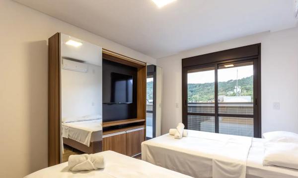 Apartamento à venda em Jurerê, novo, 3 suítes, 3 vagas, sol da manhã!