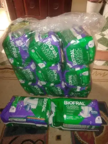 Vendo fraldas tamanho G 13 pacotes valor 100, 00