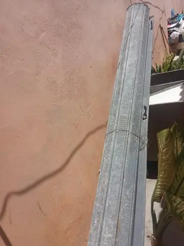 Vendo porta de enrolar conservada completa