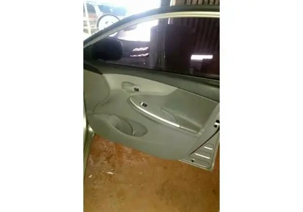 Forro de porta corolla 2010 a 2017