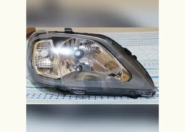 Farol Logan 2007 a 2010