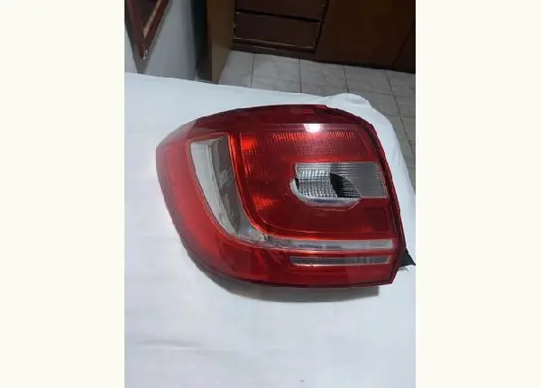 Farol original Renault lado esquerdo