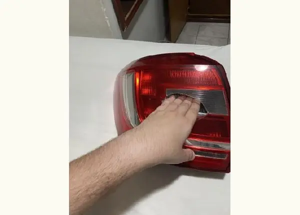 Farol original Renault lado esquerdo