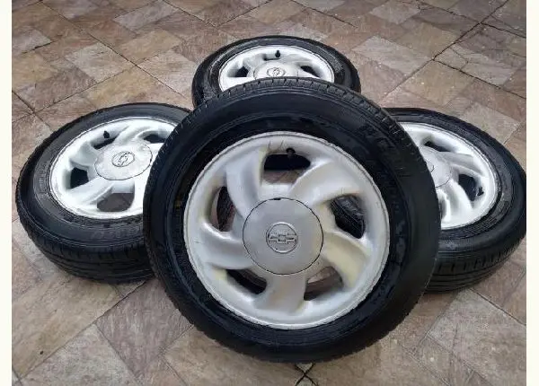 Rodas aro 14 originais GM 4x100 ótimo estado+ pneus novos