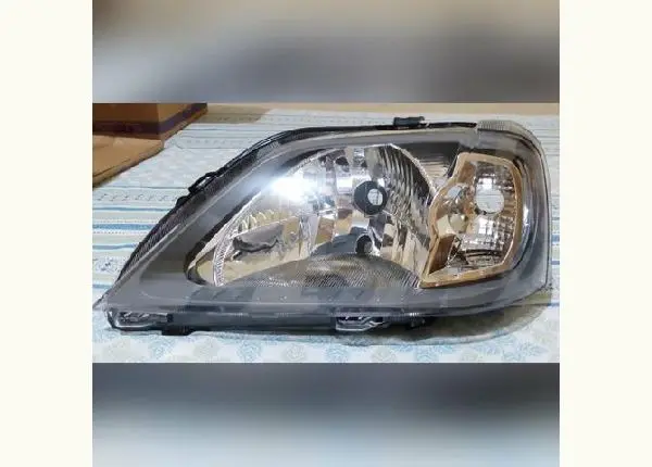 Farol Logan 2007 a 2010