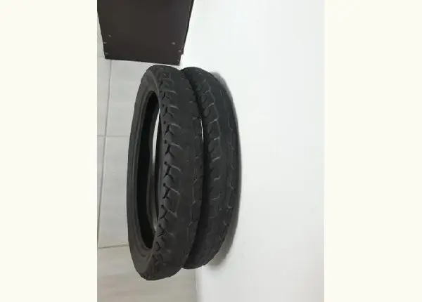 Par de pneus para cg