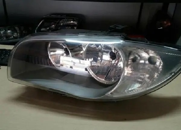 Farol bmw série 1 original esquerdo 116 118 120 cinza( 2005 2006 2007 2008 2009.)