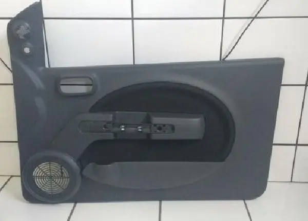 100179769DX Forro de porta Fiat Uno Vivace Diant.Direito