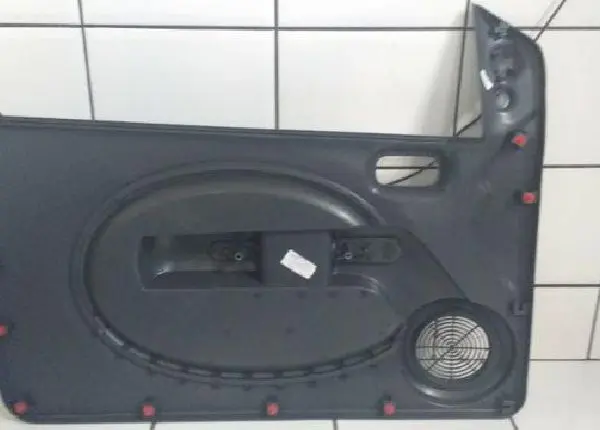 100179769DX Forro de porta Fiat Uno Vivace Diant.Direito