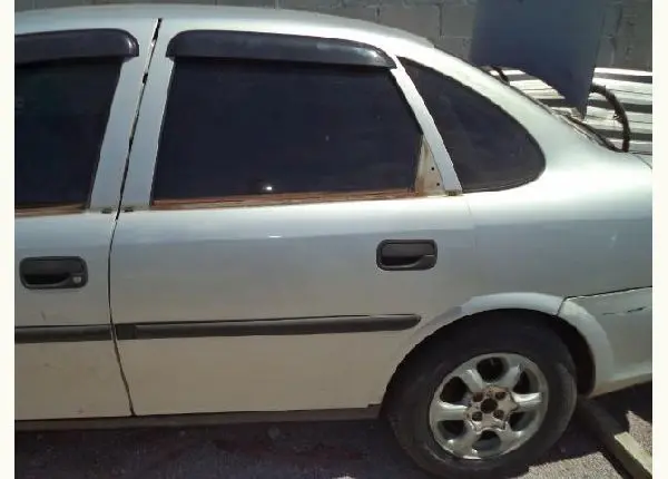 Porta traseira esquerda vectra 98