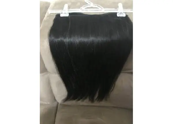 Vendo cabelo humano castanho:48 cm, 123 gramas de cabelo e 1, 09 cm tela, R$ 150, 00