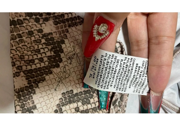 Vestido lança Perfume TAM GG