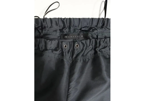 Calça corta vento Marca Annexe tamanho 46
