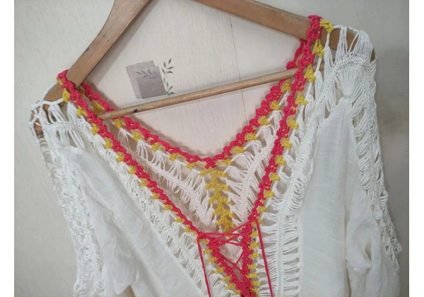 Saída de praia Tam G (44-46) 55, 00<br>ALTURA 91CM<br>LARGURA 63CM<br>MANGA FLARE