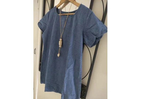 Vestido jeans leve Tam M (42) 50, 00<br>Altura 84cm<br>Largura busto 55cm<br>