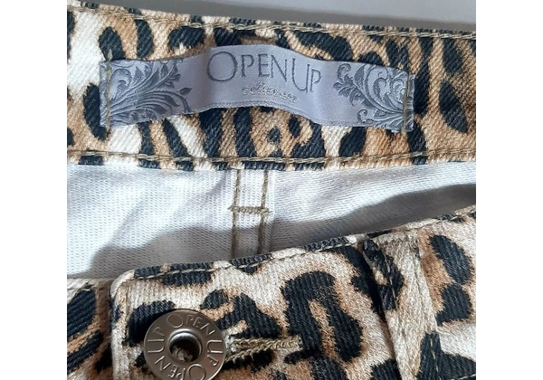 Calca jeans oncinha