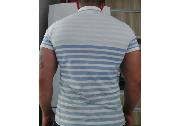Polo Lacoste.