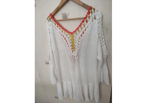 Saída de praia Tam G (44-46) 55, 00<br>ALTURA 91CM<br>LARGURA 63CM<br>MANGA FLARE