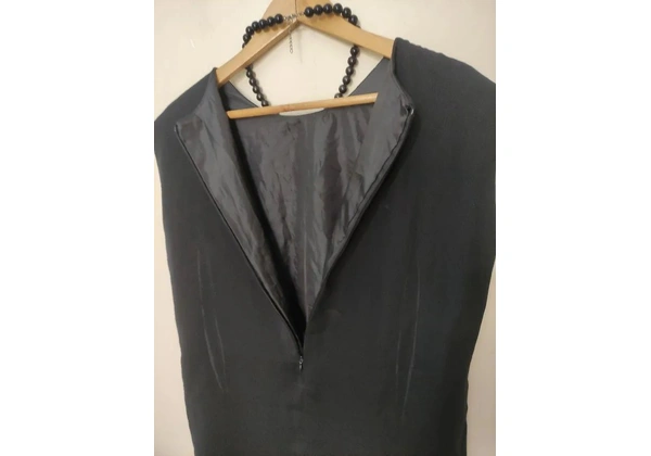 Vestido tubinho alfaiataria Tam 48 70, 00<br>Preto <br>Altura 1, 00cm<br>Busto 57cm